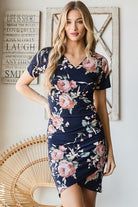https://www.lifesfuntreasures.ca › products › heimish-full-size-ruched-floral-mini-dress-plus-size-875246002