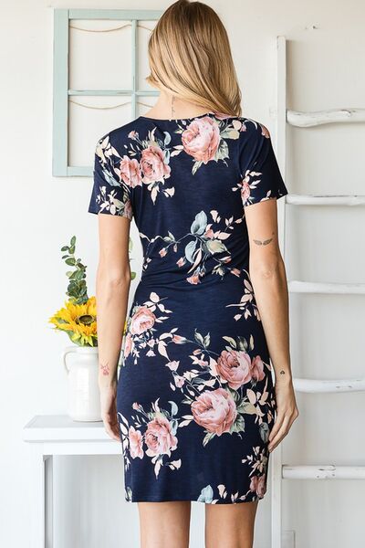 https://www.lifesfuntreasures.ca › products › heimish-full-size-ruched-floral-mini-dress-plus-size-875246002