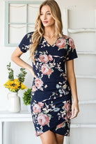 https://www.lifesfuntreasures.ca › products › heimish-full-size-ruched-floral-mini-dress-plus-size-875246002