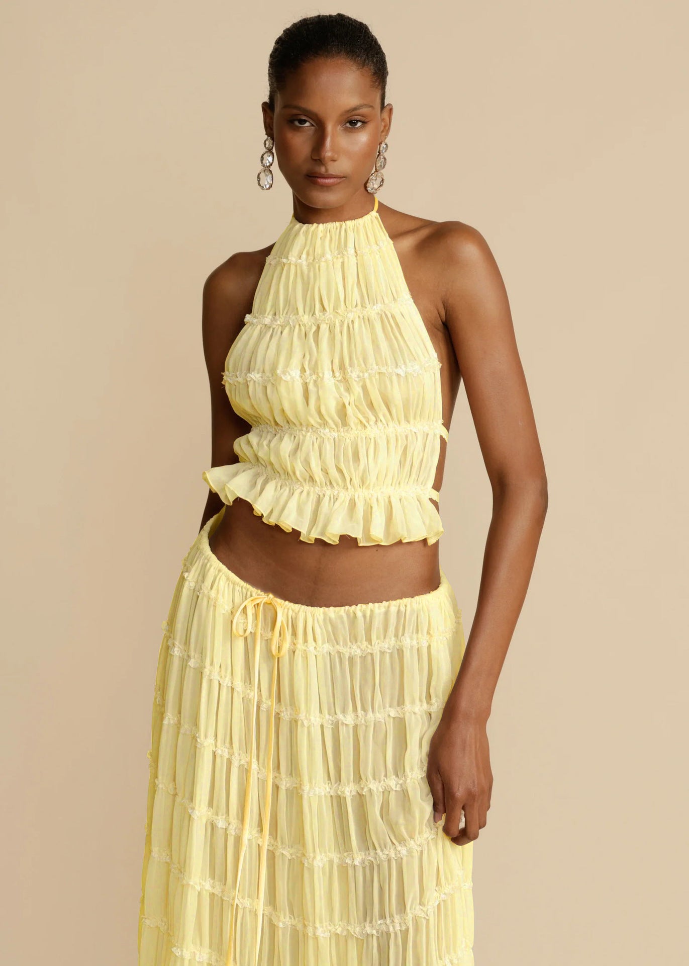 https://www.lifesfuntreasures.ca › products › womens-dress-suit-sexy-sleeveless-backless-cropped-halter-top-and-pleated-long-skirt-beach-clothing

