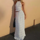 https://www.lifesfuntreasures.ca › products › womens-dress-suit-sexy-sleeveless-backless-cropped-halter-top-and-pleated-long-skirt-beach-clothing

